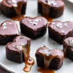 Brownie Karamell Herzen: Saftige Schokoherzen mit flüssigem Karamellkern First Image First Image